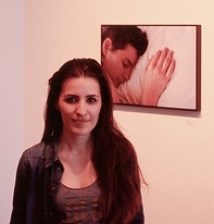 Sophia Wallace standing before one of her photographs at The Newspace Center for Photography in San Francisco, March 2013. © Tim Roth | Flickr