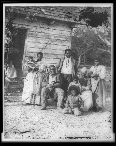 Family of African American slaves on Smith's Plantation, Beaufort, South Carolina, circa 1862. © Timothy H. O'Sullivan | learnnc.org