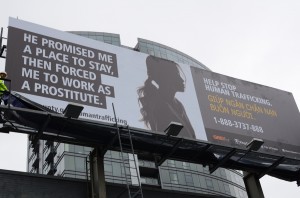Bilingual human trafficking awareness billboard © Mayor Mike McGinn | Flickr