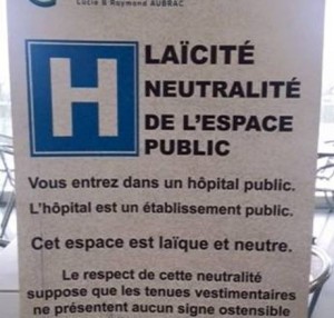 Public notice posted in a French public hospital stating that due to the âlaïque and neutralâ space of the hospital, anyone wearing an âostentatious symbol linked to a religionâ would be denied entry © Alana Lentin
