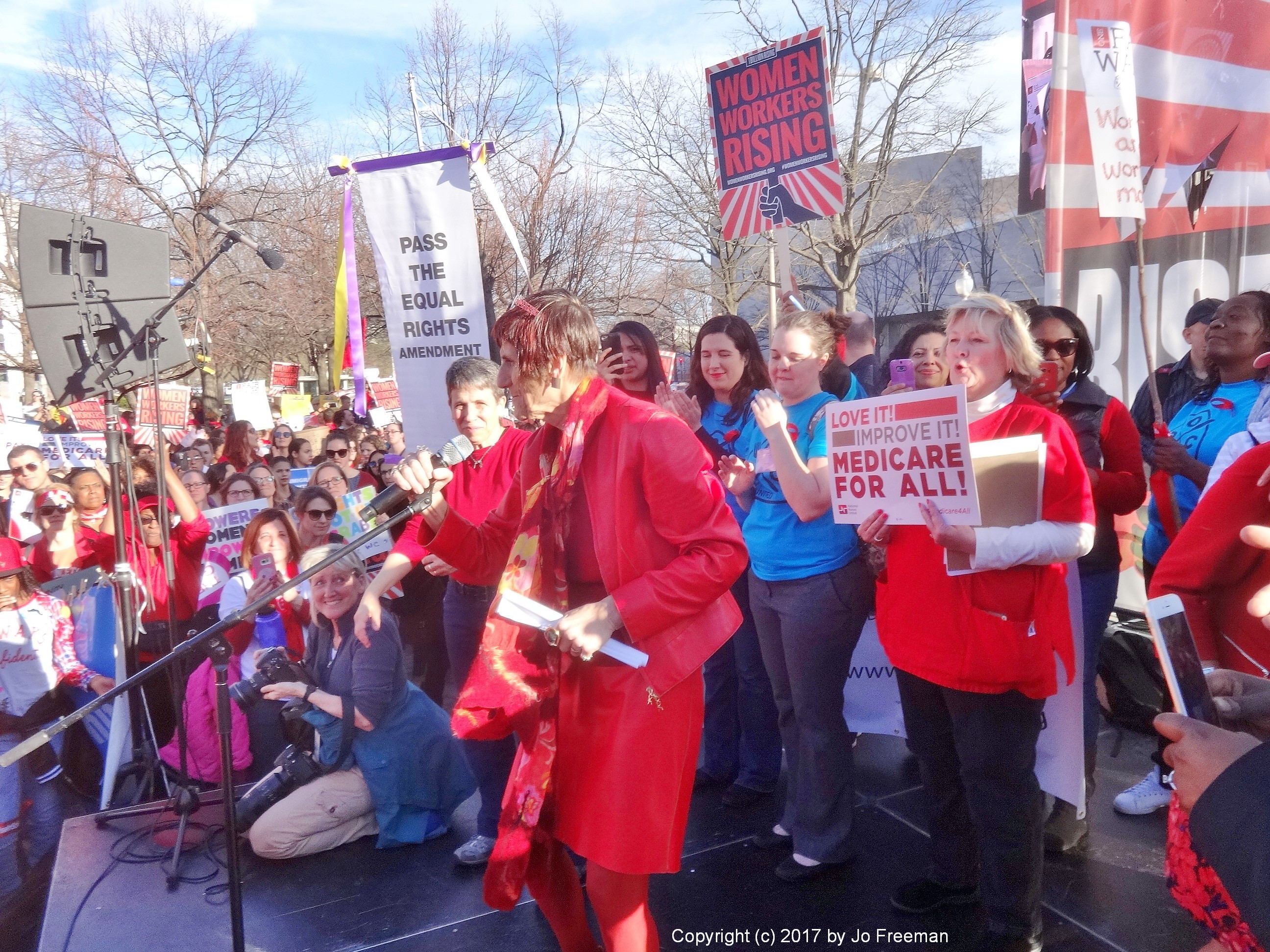 Rep. Rosa DeLauro D CT. Behind (with sign): Jean Ross, National Nurses United
