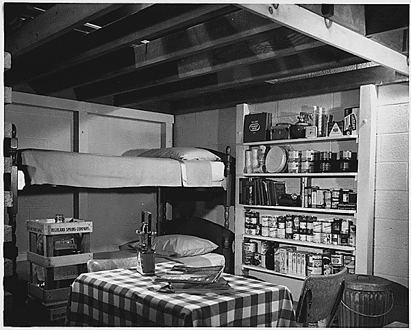 Photograph of a model Fallout Shelter, preferably with three feet of earth on top. (National Archives, RG 311)